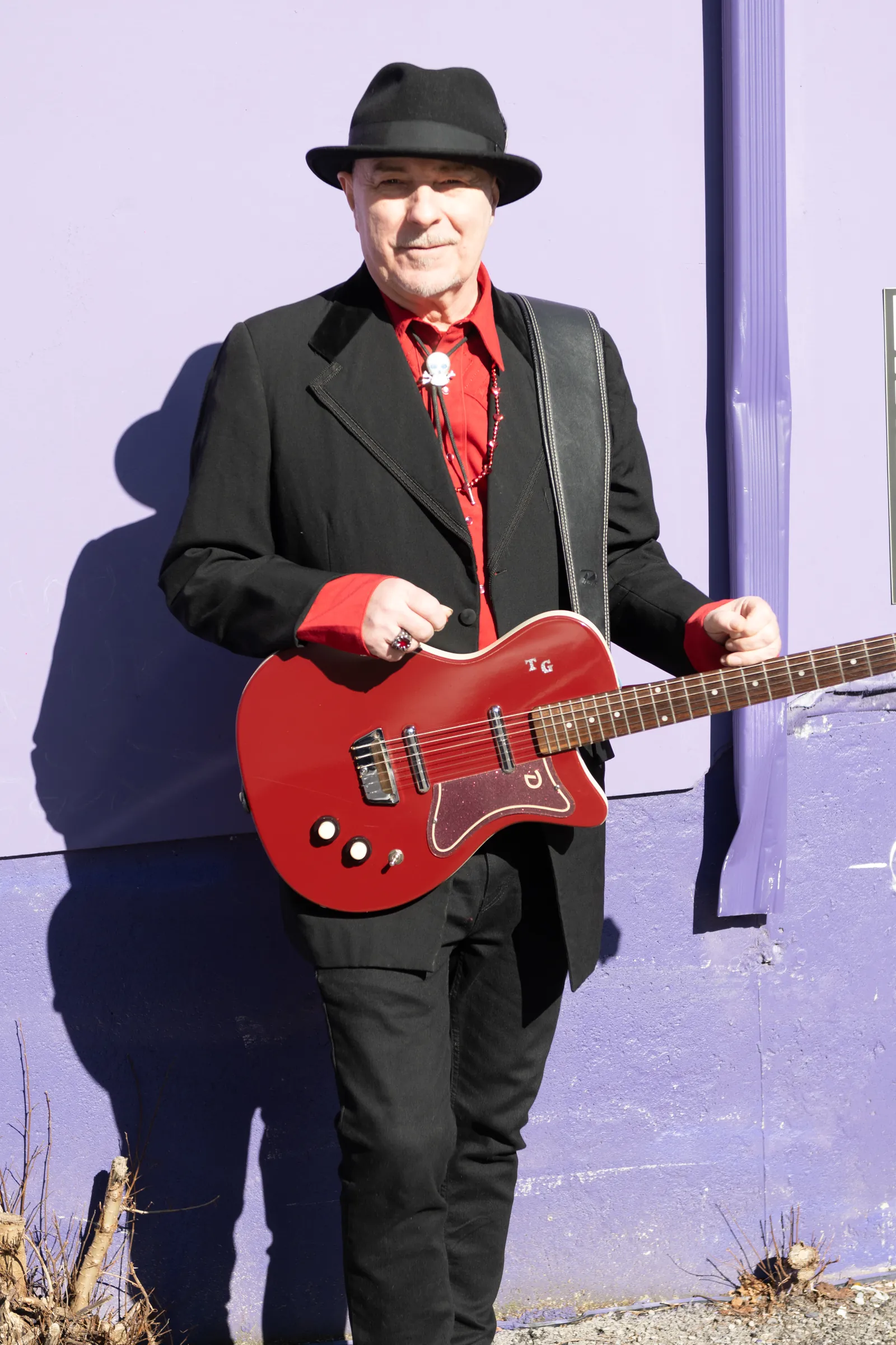 Tim Gibbons press photo: Purple wall